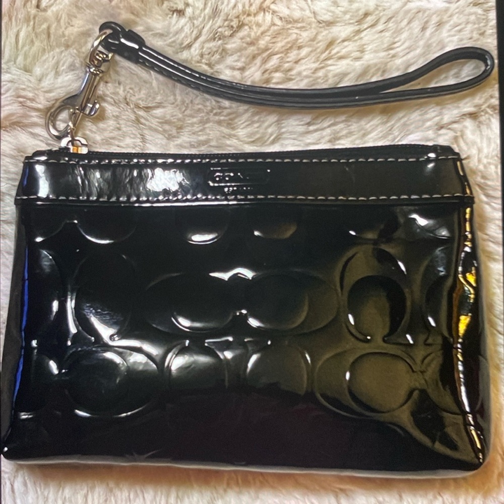 VGUC. Coach black patent leather wristlet.